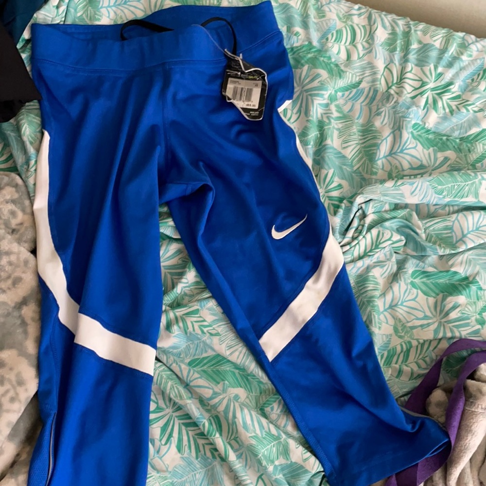 Never worn women Nike athletic shorts.